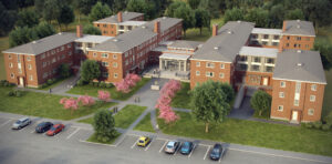 Red brick apartment complex with cherry blossom trees, landscaped pathways, and organized parking.