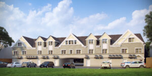Modern suburban apartment complex with balconies, green lawn, and contemporary design.